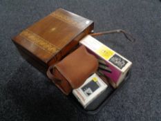 A tray of wooden table box, riding crop, vintage camera,