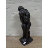 An Heredities figure of Lovers, signed Roland Chadwick 1986.