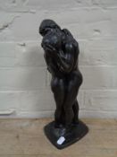 An Heredities figure of Lovers, signed Roland Chadwick 1986.