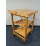 A pine kitchen butcher's block trolley