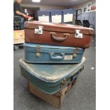 Four twentieth century luggage cases