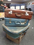 Four twentieth century luggage cases