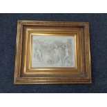 An ornately gilt framed cherub relief plaque