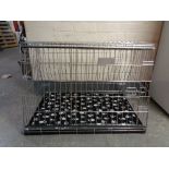 A folding dog cage,