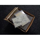 A box of twentieth century black and white & colour postcards