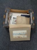 A box of un-framed pictures and prints,