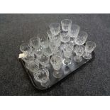 A tray of assorted crystal drinking glasses