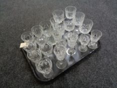 A tray of assorted crystal drinking glasses