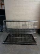 A folding dog cage,