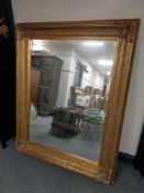 A Victorian style gilt framed overmantel mirror CONDITION REPORT: 152cm by 122cm.