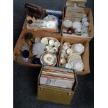 Four boxes of assorted china to include coffee cups, tea china, glass war,