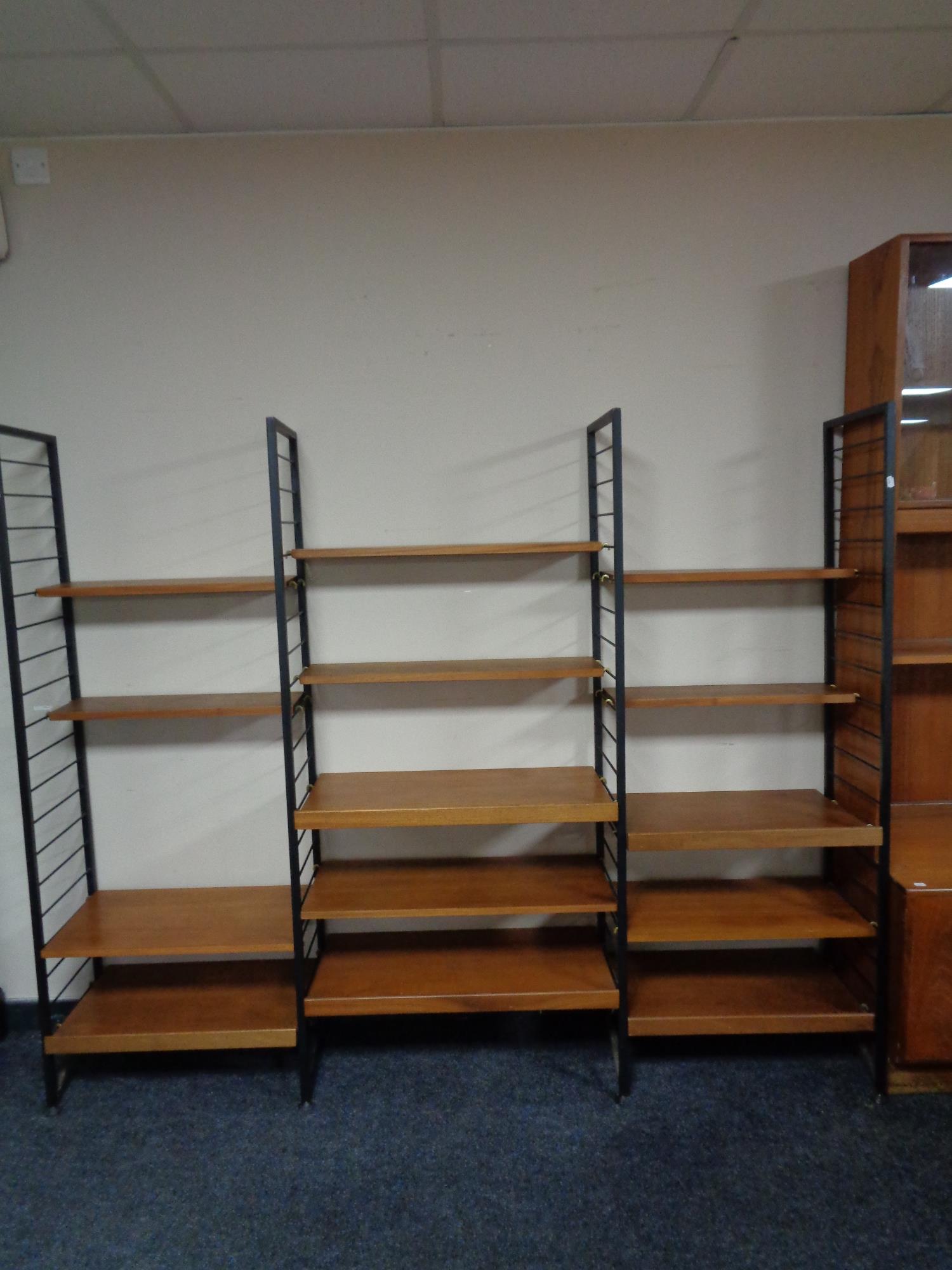 A 20th century triple bay Ladderax unit