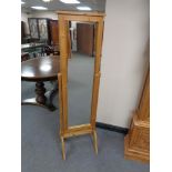 A pine storage cheval mirror