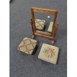 An Edwardian oak dressing table mirror and two antique footstools