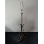 An early 20th century brass standard lamp