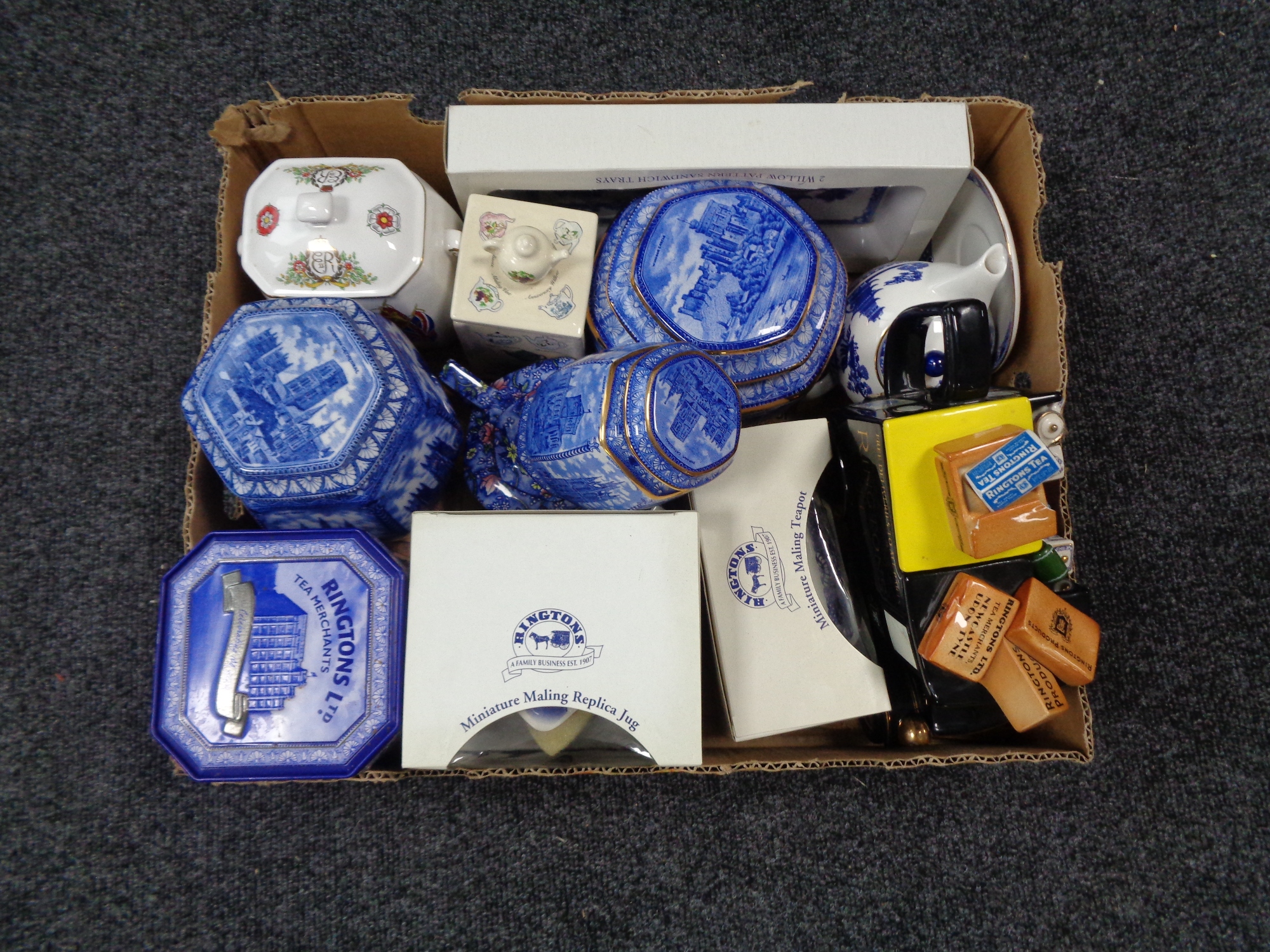 A box and a tray of assorted Ringtons china to include caddies, teapots,