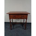 A side table fitted with a drawer