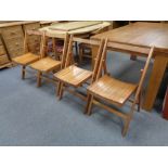 Four folding mid 20th century chairs