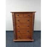 An Eastern hardwood Wellington style six drawer chest