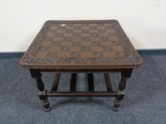 A chess board topped coffee table