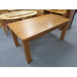 A heavy pine dining table