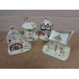 Four Coalport pastille burners to include The Umbrella House, The Crooked Cottage,