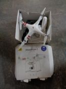 A boxed Phantom 3 standard drone with control hand set