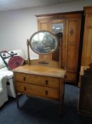 A 1930's oak mirror door wardrobe and dressing chest