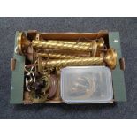 A box of brass twist column lamps, lamp fittings,