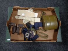 A box of military items, pocket compass, food canteen,