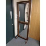 A 20th century stained wood adjustable glass cheval mirror