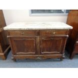 A 19th century French oak double door washstand with white marble top CONDITION REPORT: