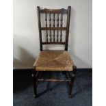 A rush seated country kitchen chair