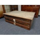 A four drawer plan chest CONDITION REPORT: 126cm wide by 92cm deep by 42cm high.