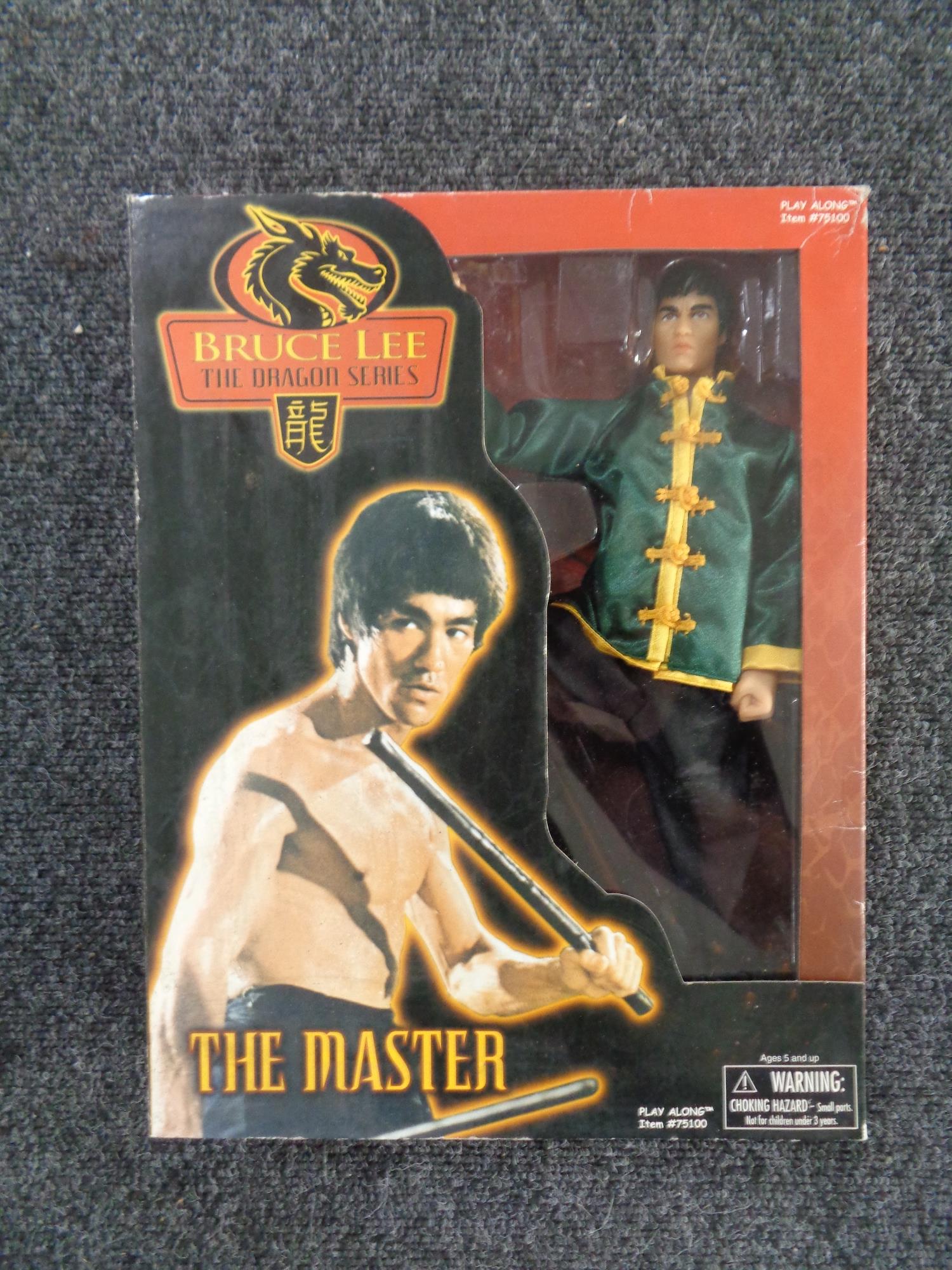 A boxed Bruce Lee Dragon Series action figure