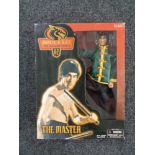 A boxed Bruce Lee Dragon Series action figure