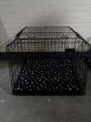 A folding dog cage, with divider,