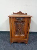 An Edwardian coal receiver converted to a bedside cabinet