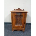 An Edwardian coal receiver converted to a bedside cabinet