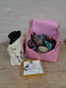 A tray of two bags of costume jewellery and a dressing table brush set