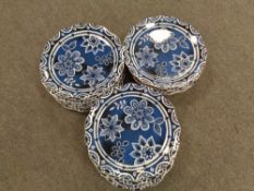 A set of twenty-four ironstone indigo floral scalloped edged plates CONDITION REPORT: