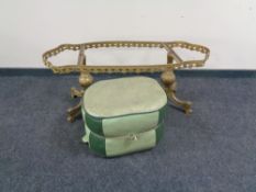 An brass coffee table base and a mid 20th century leather footstool