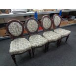 Four mahogany dining room chairs