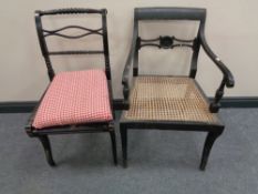 An antique bergere seated armchair and an ebonised bobbin occasional chair