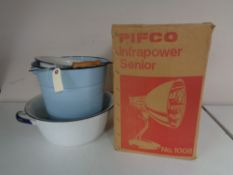 Four pieces of enamelled ware together with a boxed Pifco infrared lamp