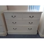 A Victorian pine four drawer chest with brass drop handles