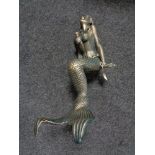 A metal figure - Mermaid