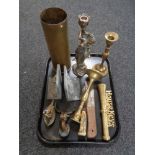 A tray of metal ware - brass candlesticks, ammunition shell, hunting knives,