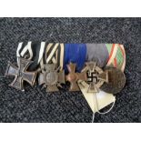 A group of five WW I medals on ribbons