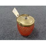 An early twentieth century pink glass and plated biscuit barrel